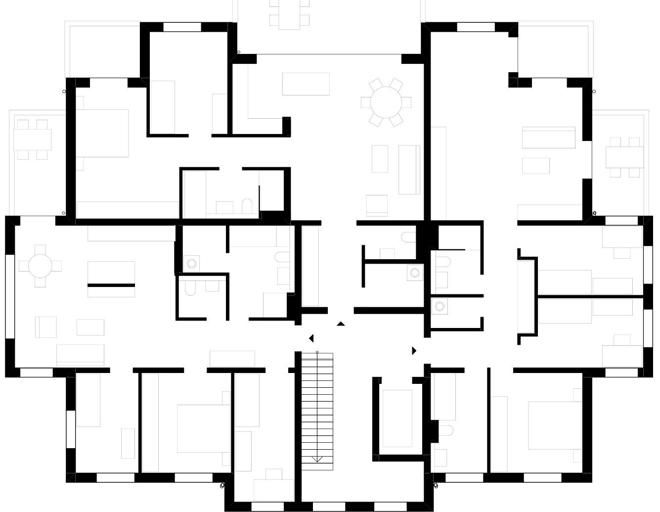 Grundriss eines Regelgeschosses der Mehrfamilienvilla Therese: Wohnungen um das zentrale Treppenhaus, mit Balkonen und Möblierung